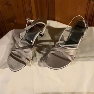 Unlisted by Kenneth Cole, silver gold color, size 9, 1.5 in heel, never worn